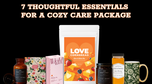Flat lay of Baltimore-made gift items including Love & Cornbread Rise & Shine cornbread mix, candles, tea, honey, mug, and journal on a black background with title text “7 Thoughtful Essentials for a Cozy Care Package.”